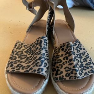 Animal print sandals.